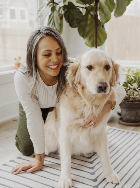 Dr. Blount sitting with her dog, Hank.