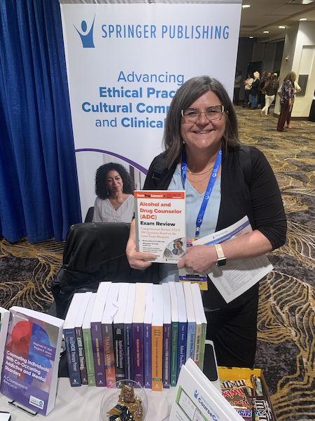 Dr. Christine (Tina) Chasek with her new book.