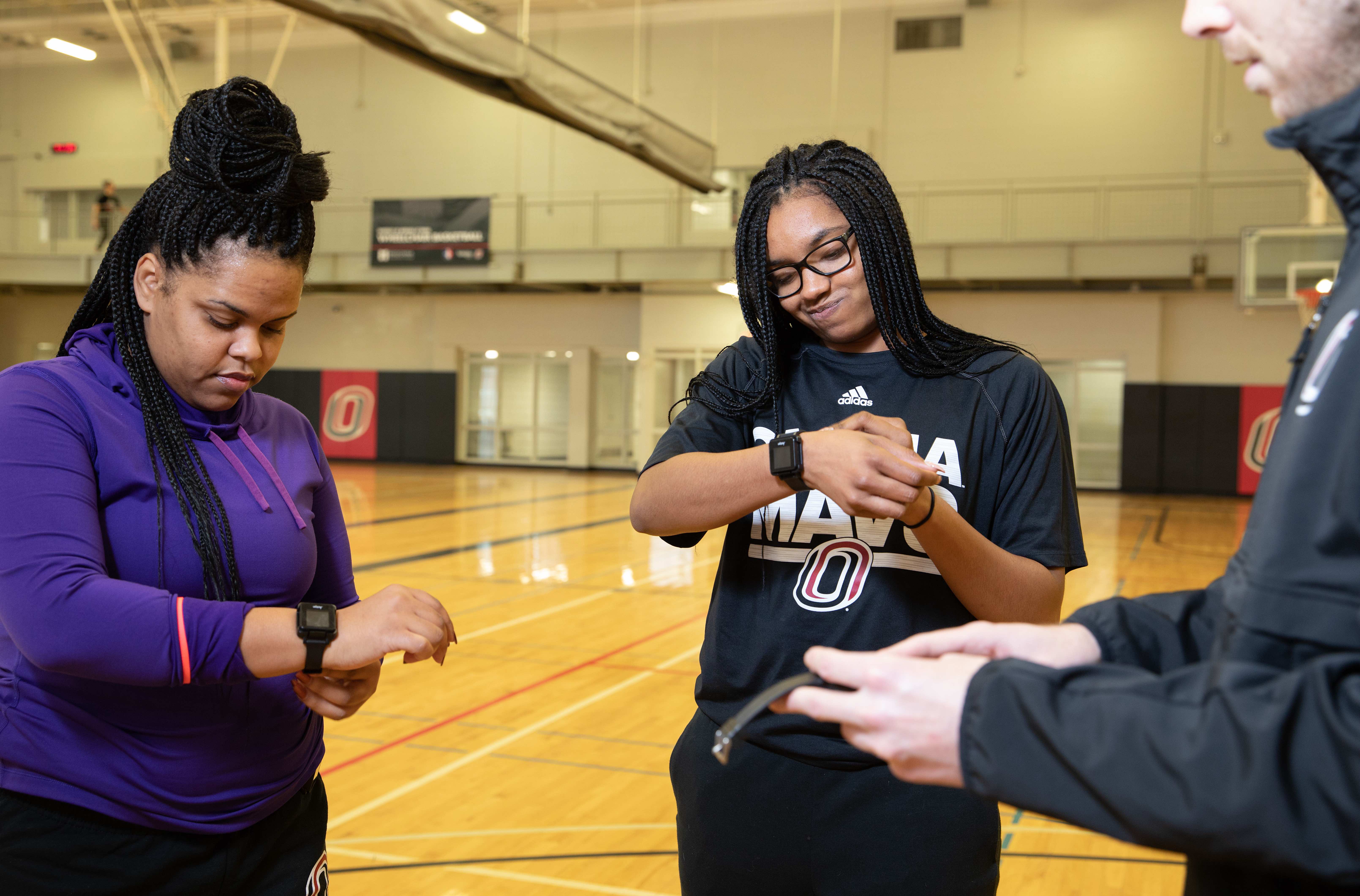 Physical Activity in Health Promotion students testing out accelerometers