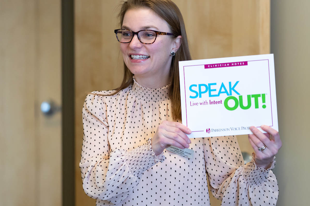 Lucia Scheffel, Ph.D., CCC-SLP stands in a lab in the Speech-Language Clinic