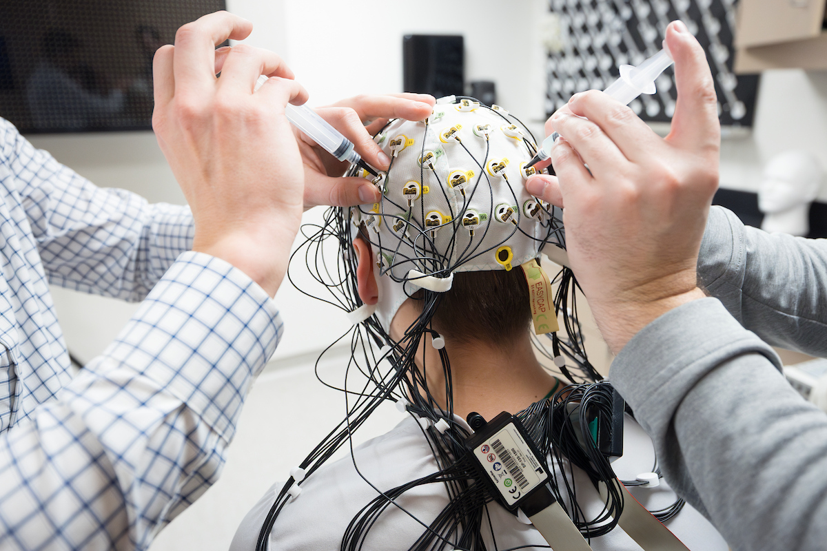 Preparing the EEG cap.