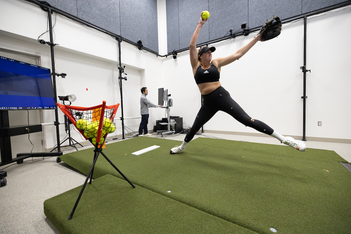Softball pitcher completes a biomechanics assessment at the UNO Pitching Lab. 