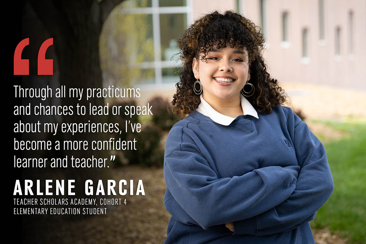 Arlene Garcia stands in front of Roskens Hall