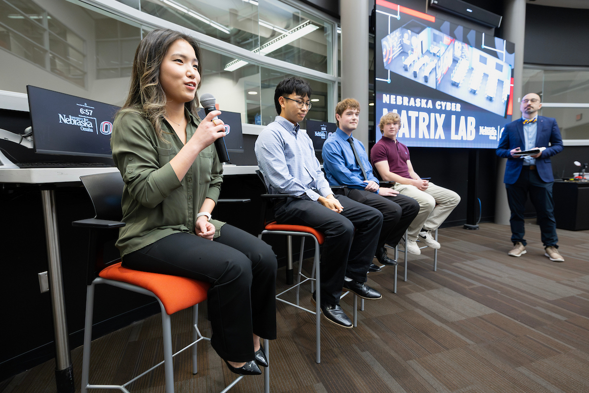 Students from the inaugural Nebraska Cyber Matrix cohort share their experiences during a panel discussion at the Nov. 12 grand opening event.