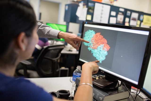 students work at a computer