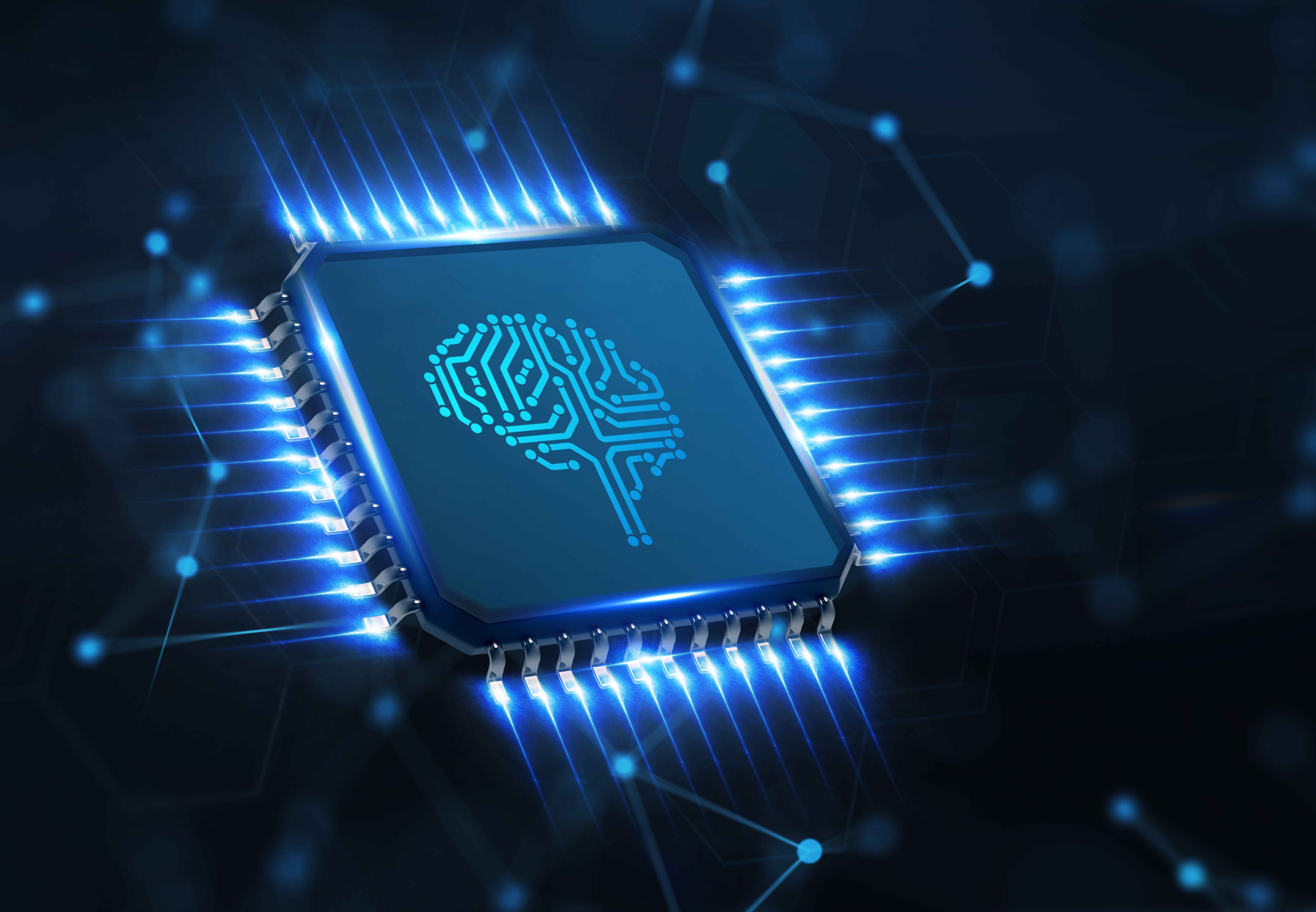 Illustration of a glowing microchip with circuit lines and a stylized brain design at the center, symbolizing artificial intelligence hardware.