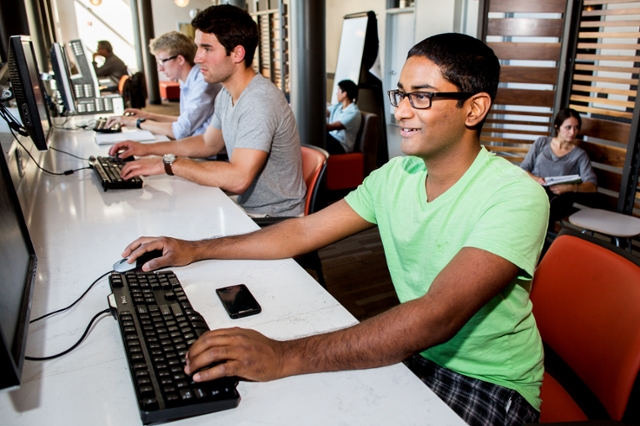 Student working at a computer.