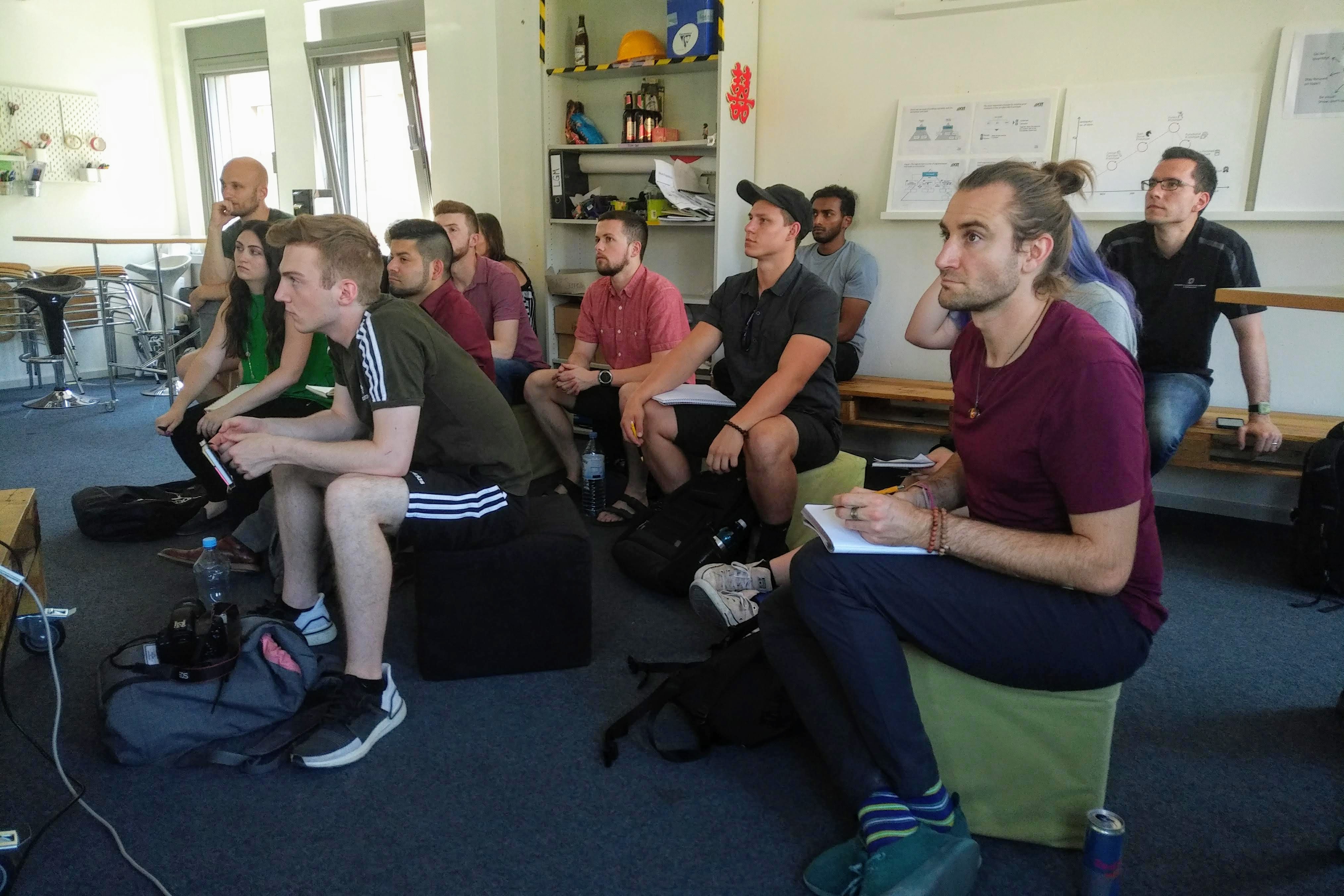 Students sit in a classroom in Germany.