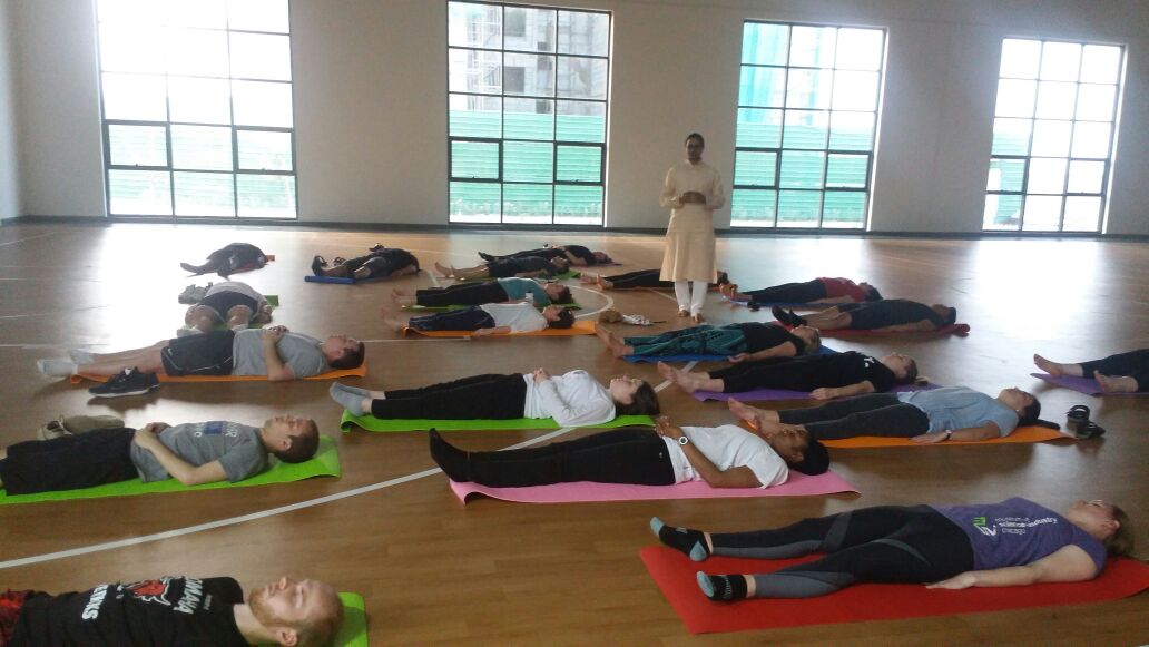 Students attend Yoga session
