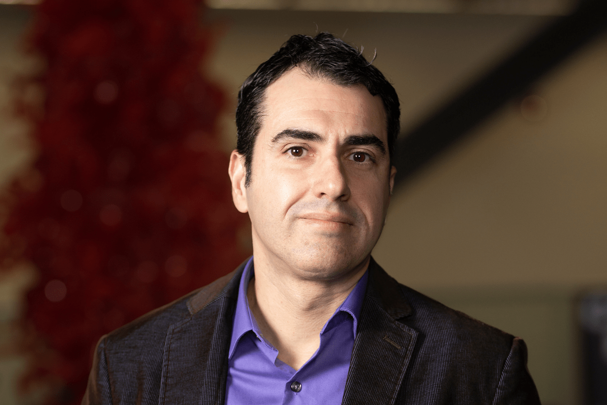 Dr. Dario Ghersi, associate professor of biomedical informatics at UNO, poses for a portrait in the Peter Kiewit Institute, home of the UNO College of Information Science and Technology.