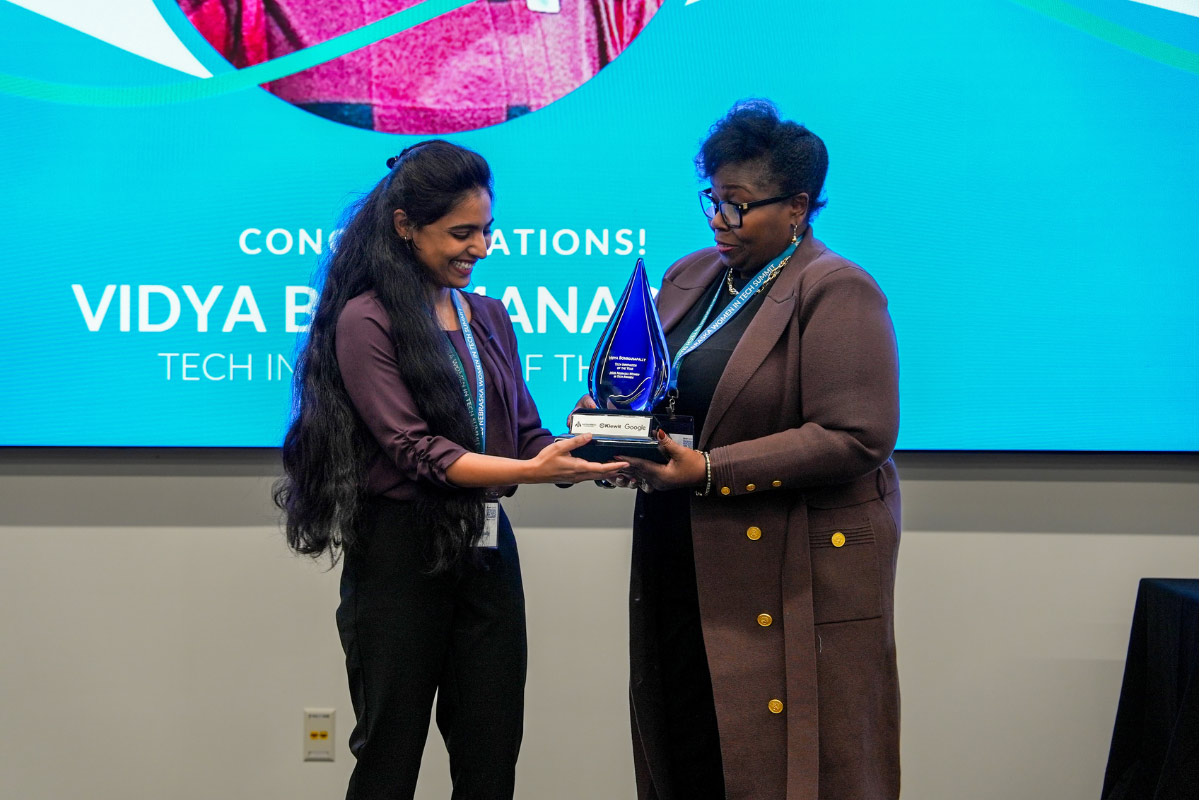 Vidya Bommanapally receives the Tech Innovator of the Year award at the Nebraska Women in Tech Summit during the awards ceremony.