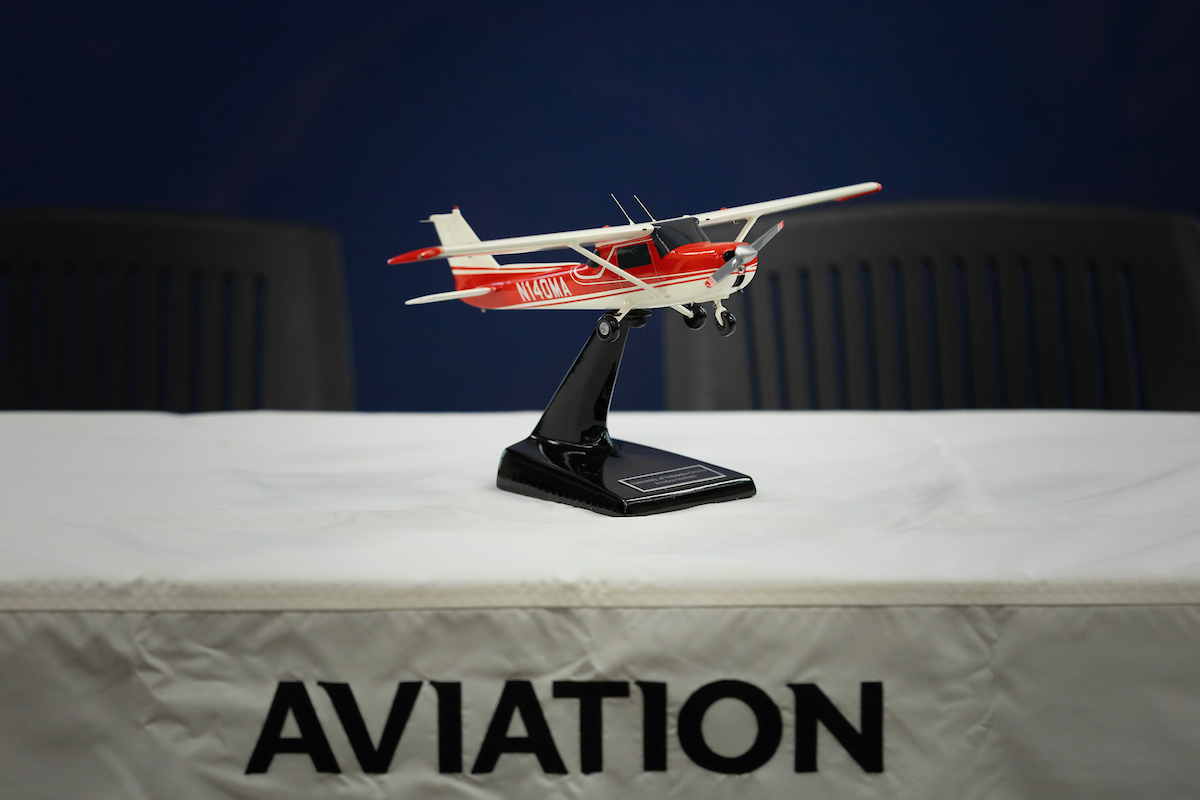 UNO model airplane sitting on a table