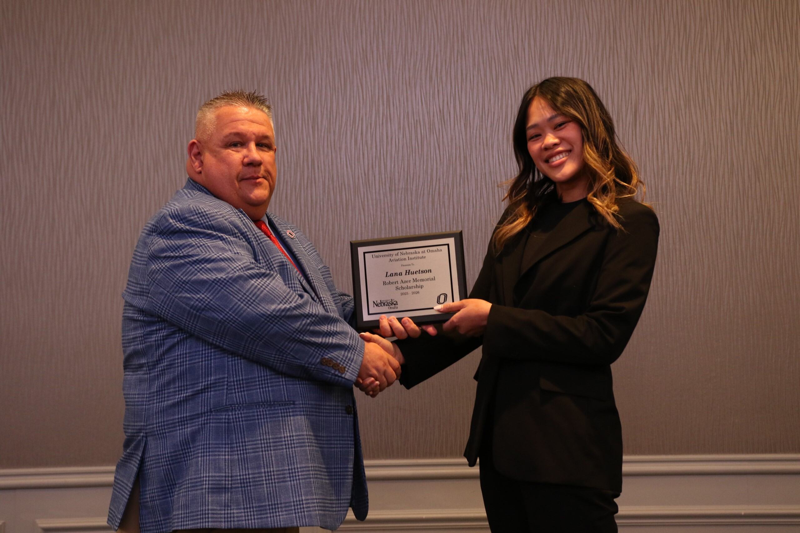 student receiving the Robert Azer Memorial Scholarship