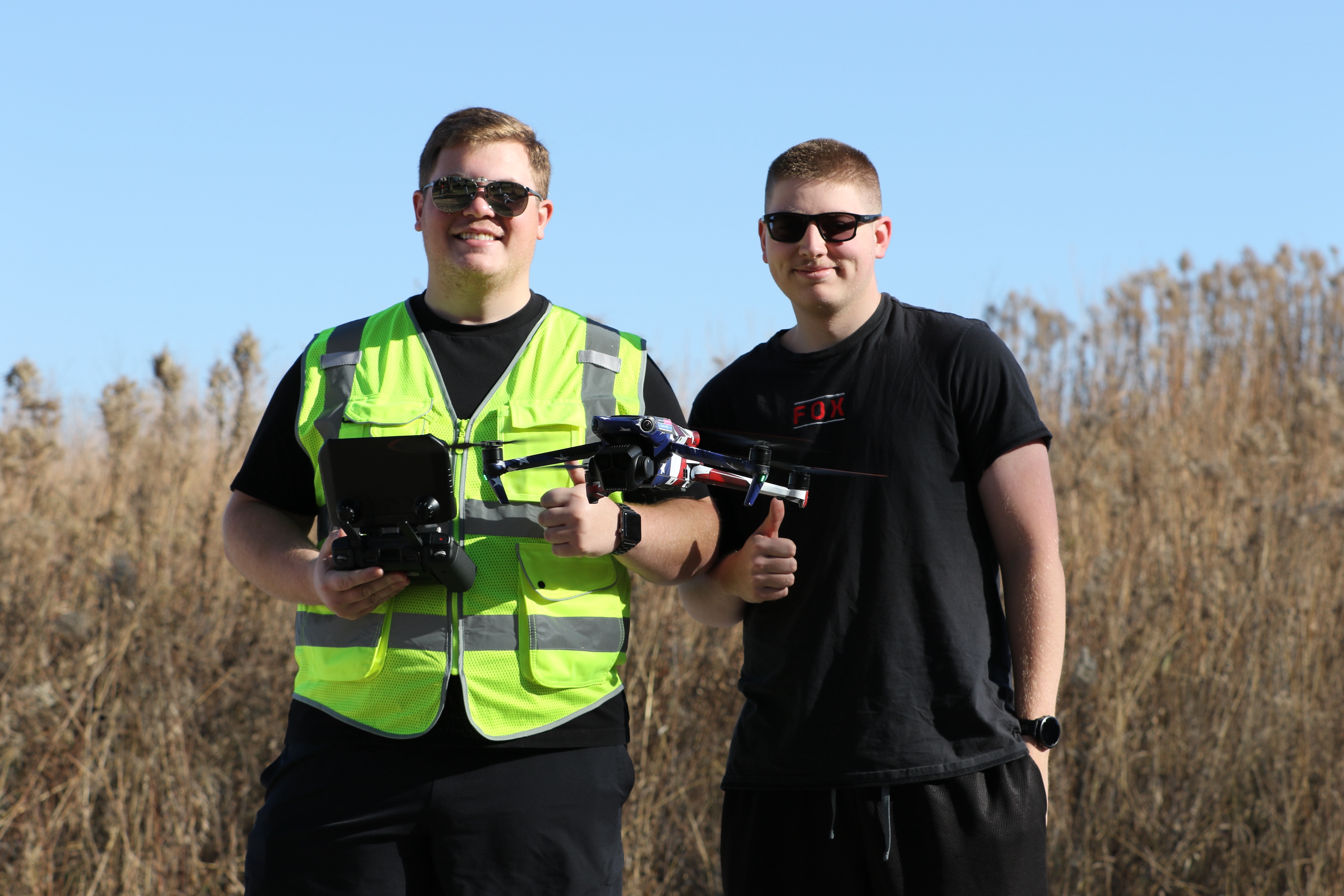 Student flying a drone. 