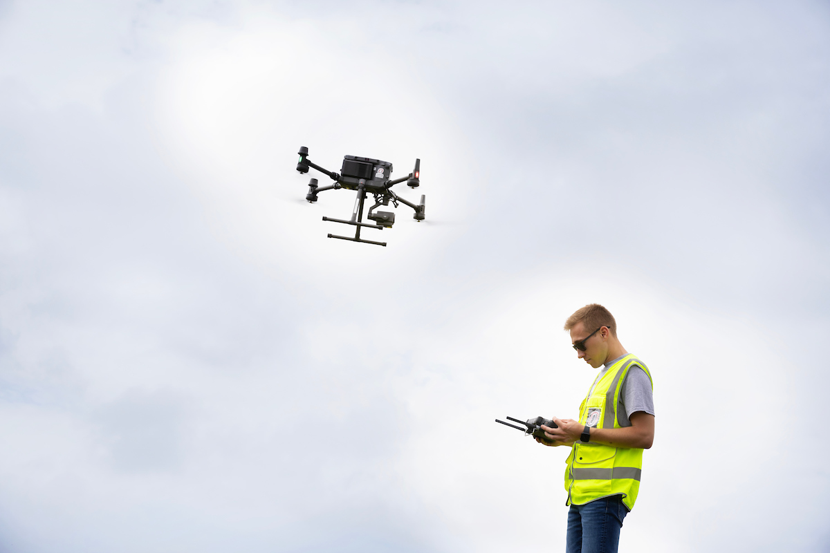 Flying a drone. 