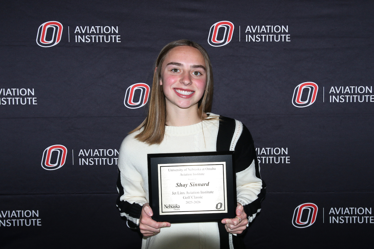 student receiving the Jet Linx Aviation Institute Golf Classic Scholarship
