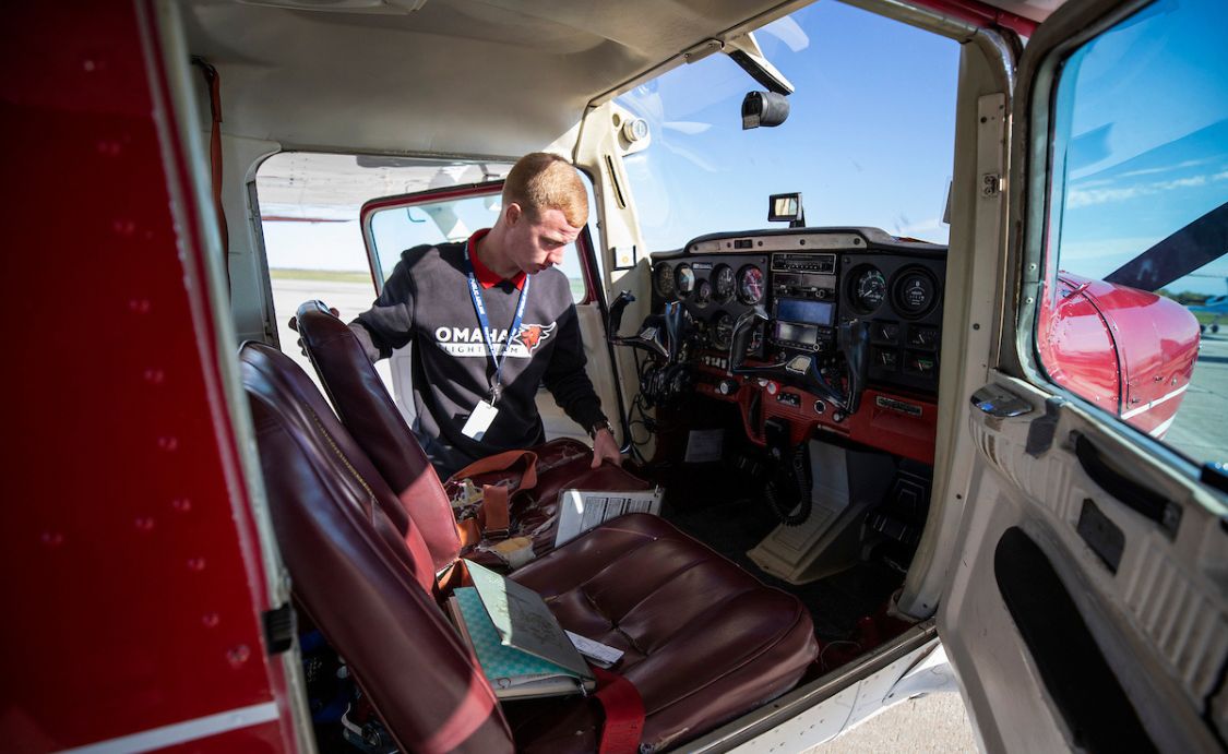 Student in an airplane. 