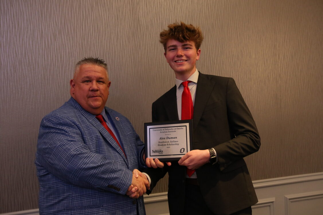 student receiving the Bruce Tuttle Memorial Scholarship