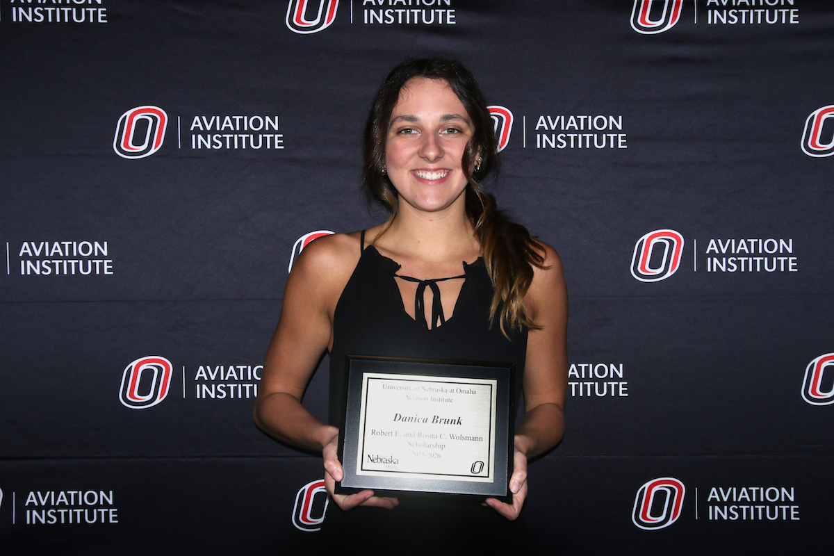 student receiving the Robert E. and Rosita C. Wolsmann Memorial Scholarship