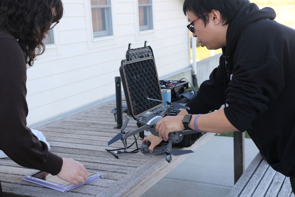 Faculty working on drone