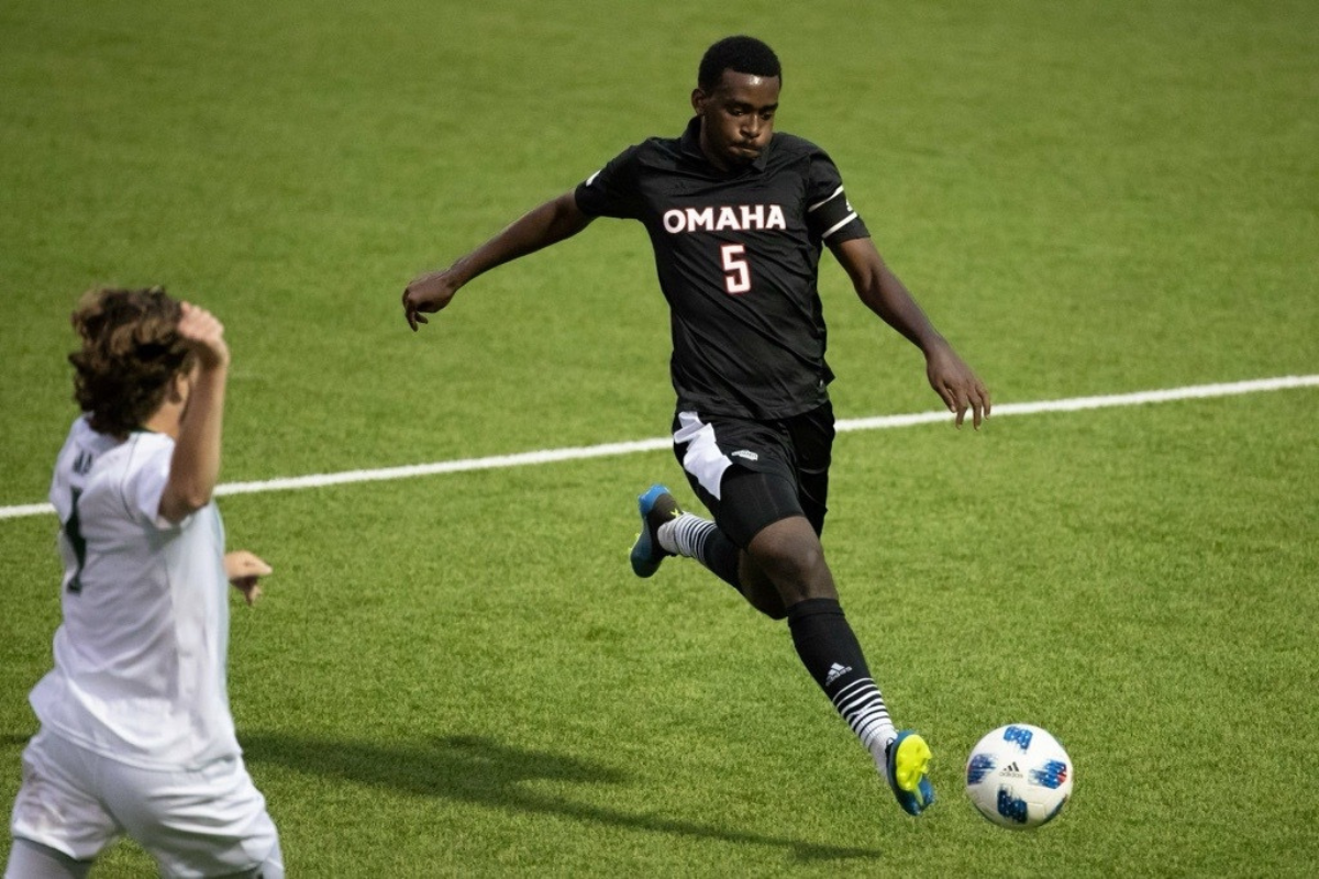 Denzel Woods, playing soccer at UNO