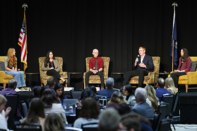CPAR Director Josie Gatti Schafer moderating a panel at the 2026 Nebraska Governor's Summit.