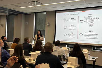 Director Josie Gatti Schafer presenting at the Grow Sarpy First Quarter Investor Meeting