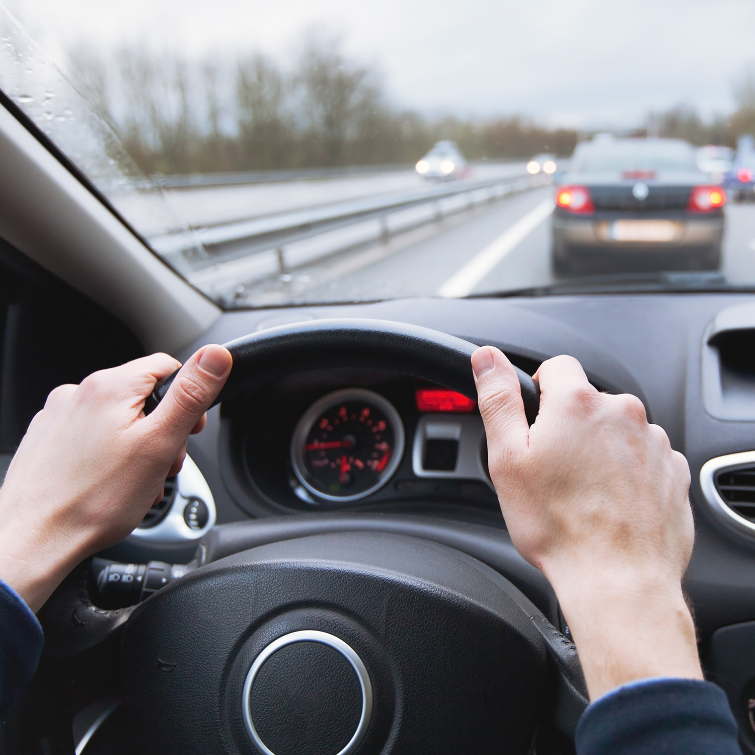 photo of a person driving a vehicle