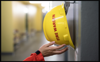 fire warden hat hanging on the wall.
