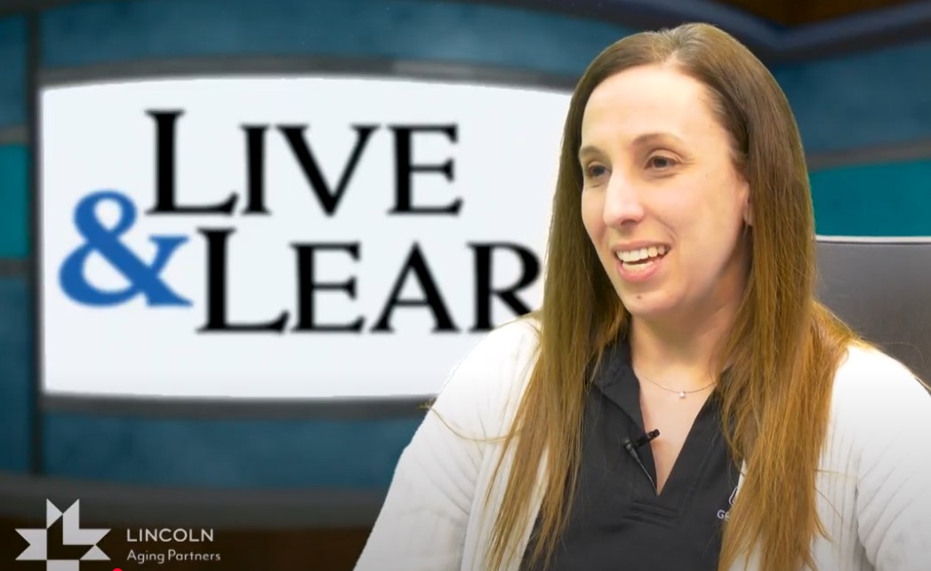 Dr. Lindsay Wilkinson being interviewed on television
