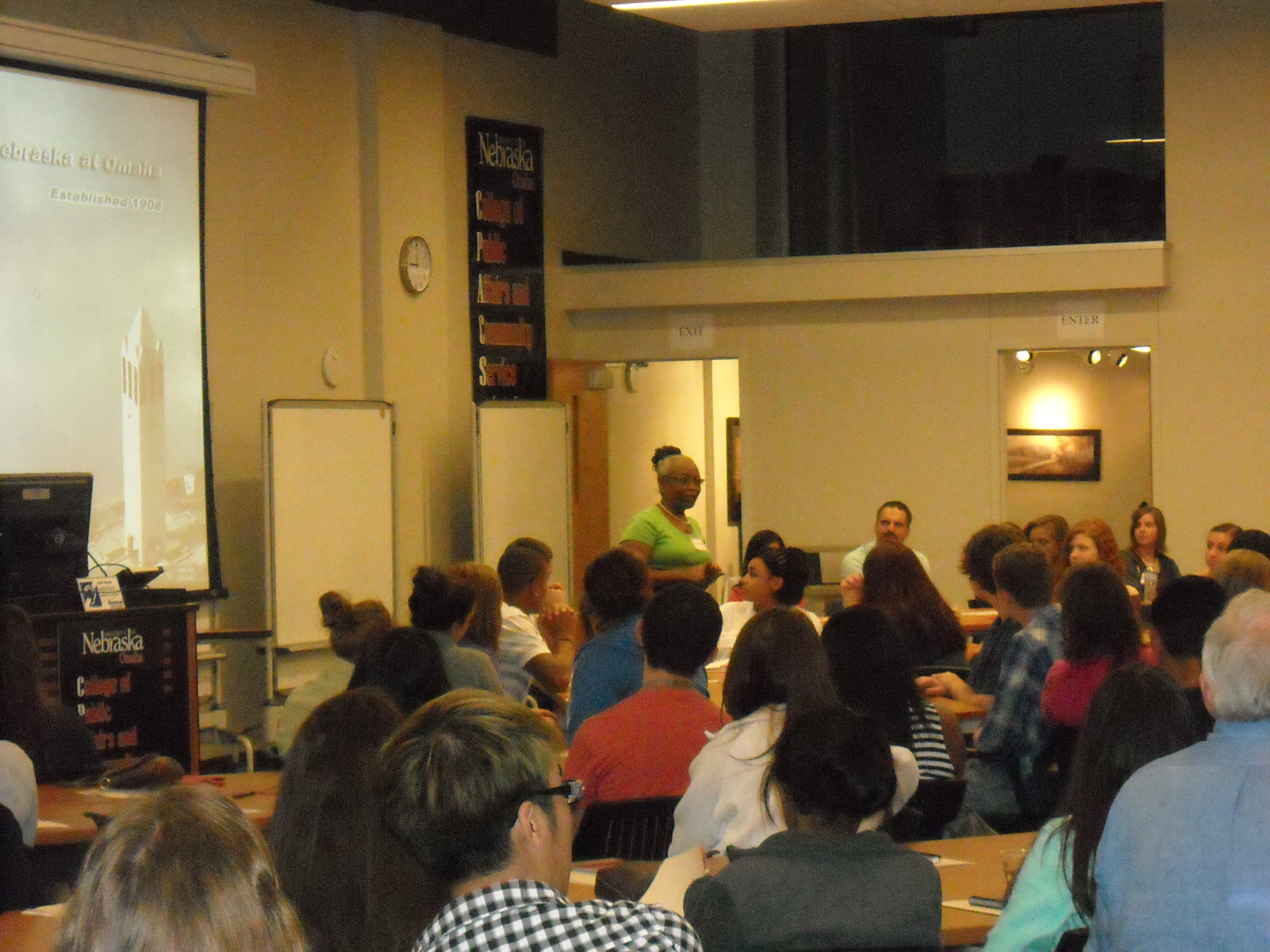 Pamela Smith standing in front of a classroom full of students.