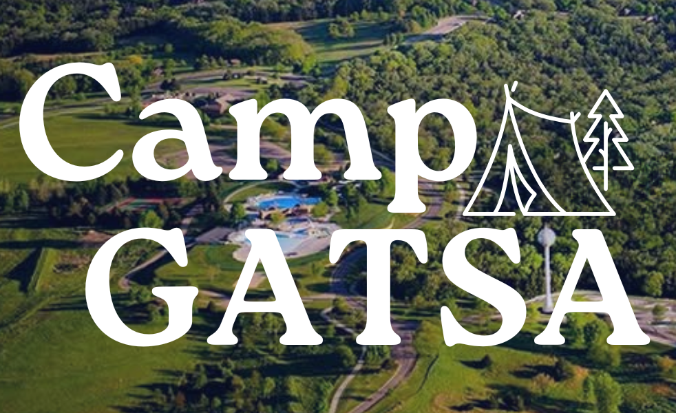 text 'Camp GATSA' over a picture of a top down view of a group of trees