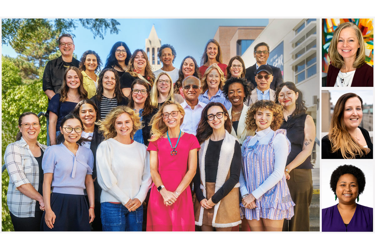 Group of faculty, staff, and students posed in front of the clock tower.