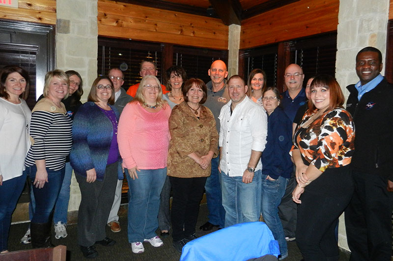 Participants of the Teacher Training Program, posing with Astronaut Clay Anderson