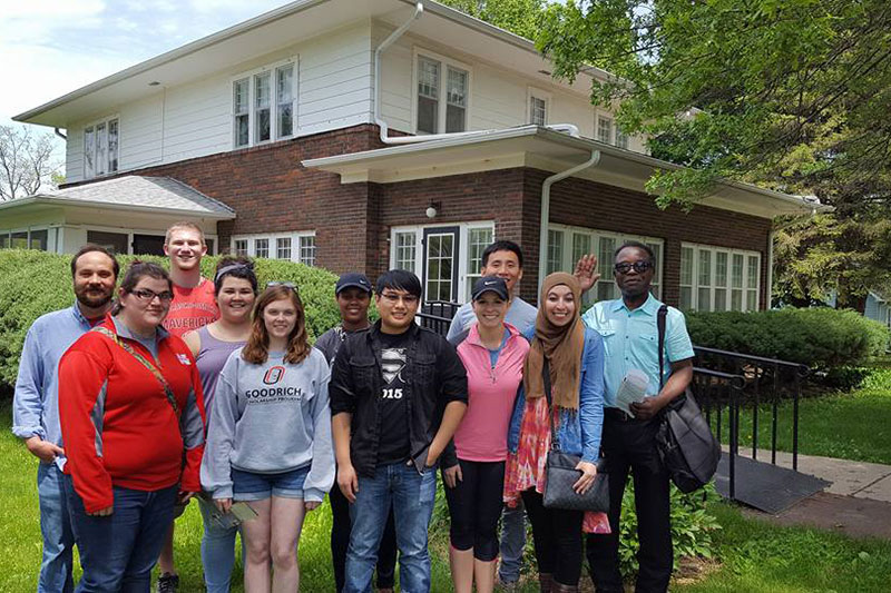 Goodrichers in front of Aldrich's home in Elmwood.