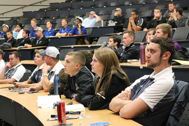 The Flying Mavs listening to a presentation at the conference.