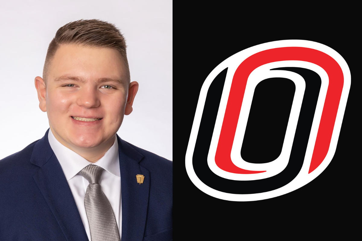 Jack Adrian next to the UNO "O".