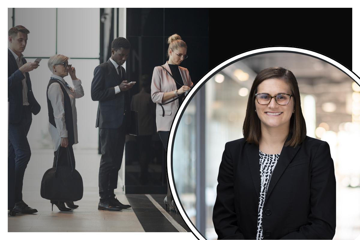 Dr. Morgan Vogel in front of four business travelers.