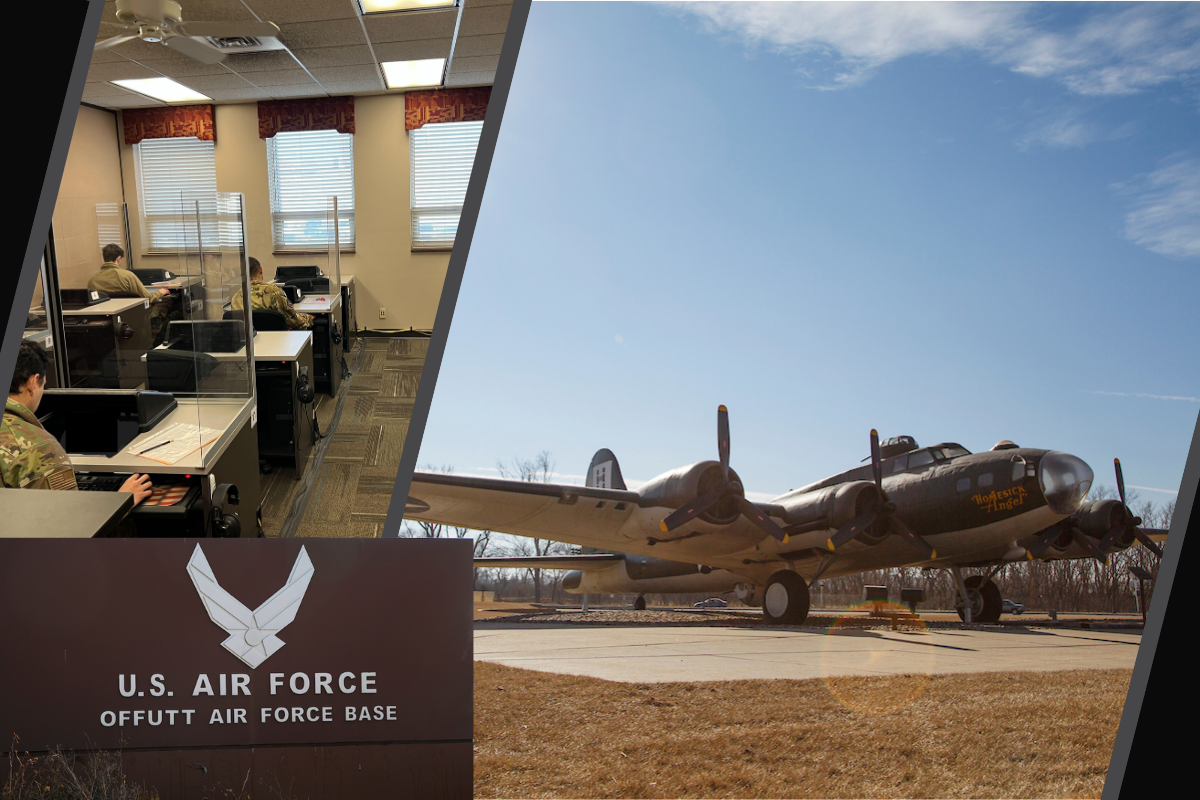 Military students taking a test in the test center with a stationary historic airplane in the background.