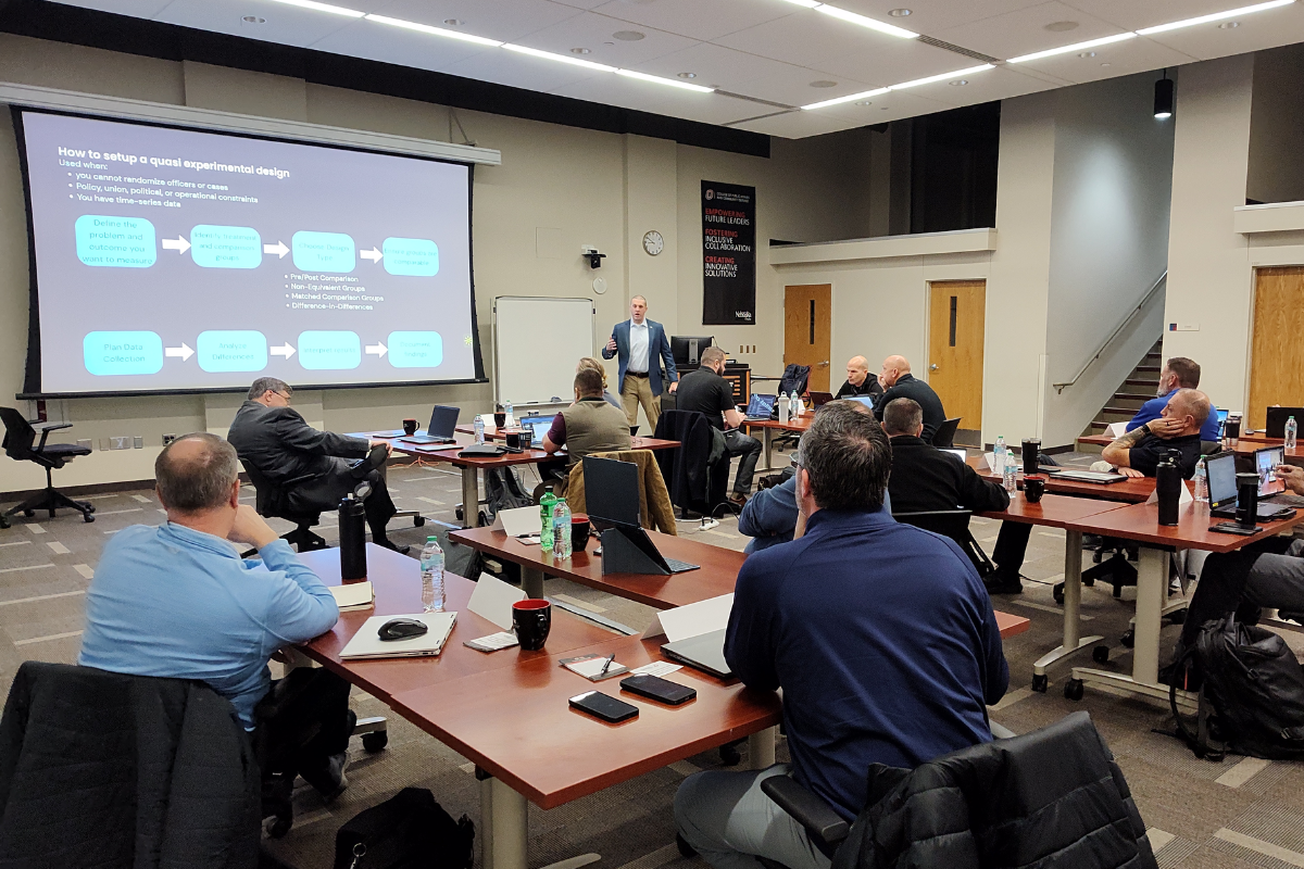 Lieutenant Matthew Barter from the Manchester, New Hampshire, Police Department presenting to classroom of police officers.