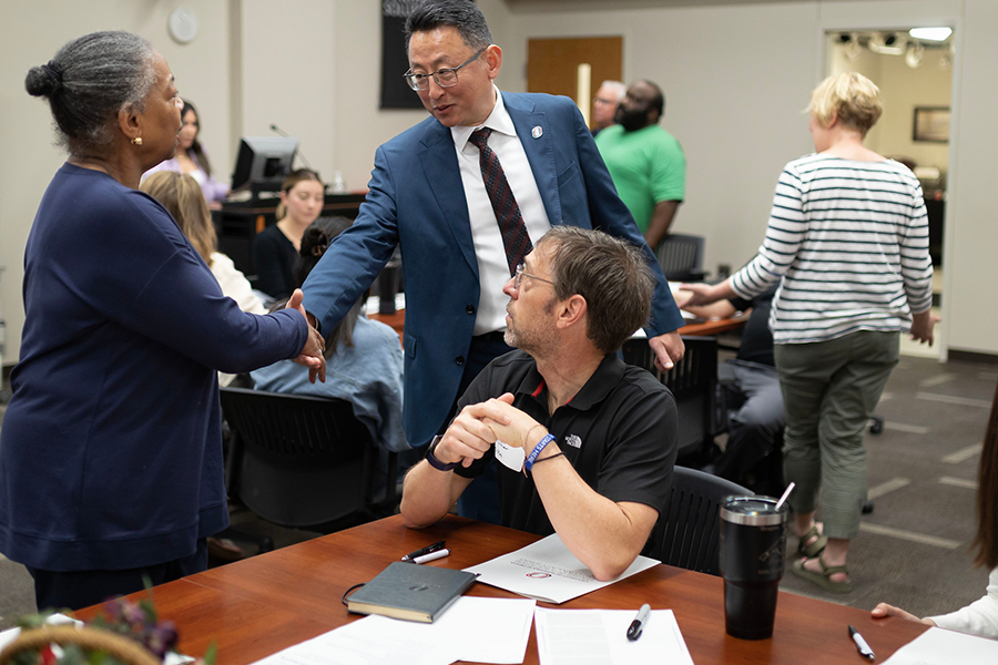 people talking in a meeting