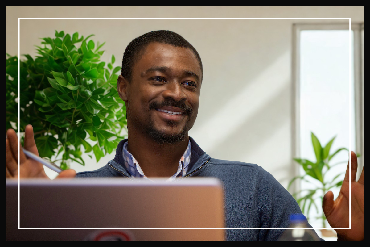 student sitting in front of a laptop.