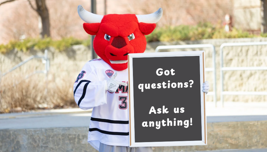 Durango holding a sign saying "got questions? AMA"