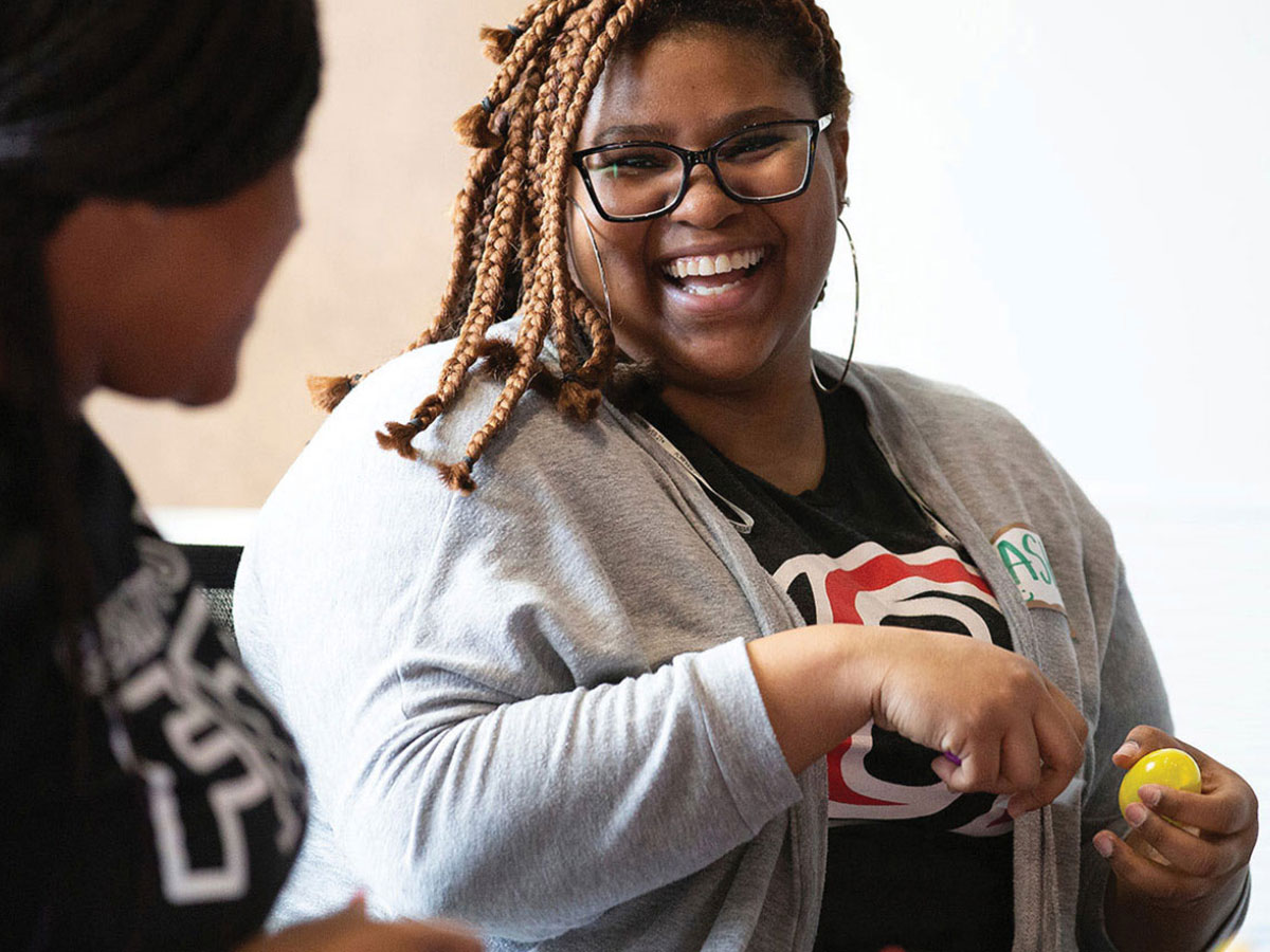 uno student doing service work 