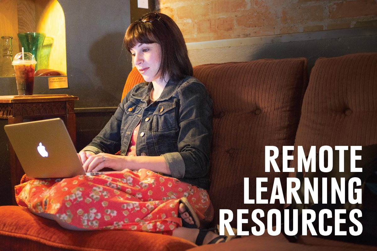 Student studying from couch