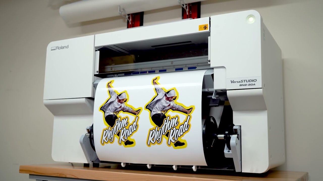 Equipment picture of a Roland BN2-20A vinyl decal printer and cutting machine.