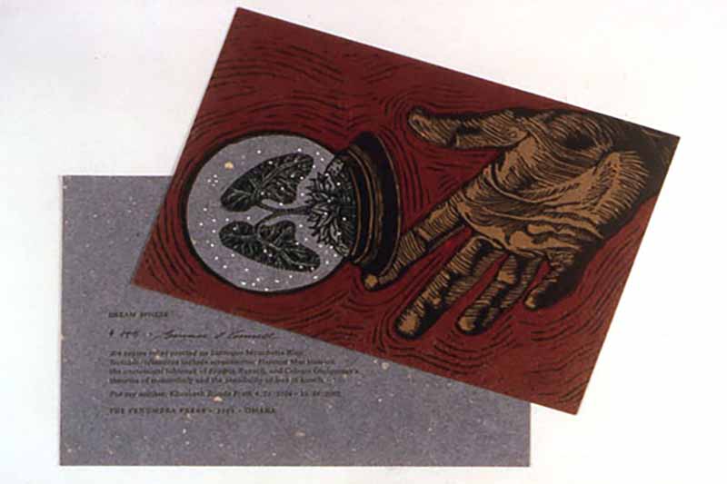 letterpress print of hand and human organ