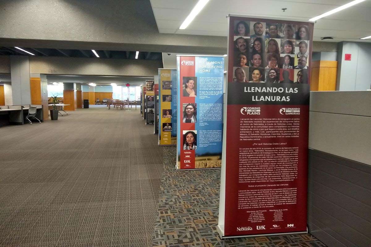 stand up display banners lined up next to a wall 