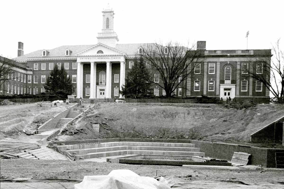 Arts and Sciences Hall viewed from the north with construction of Roskens Hall underway