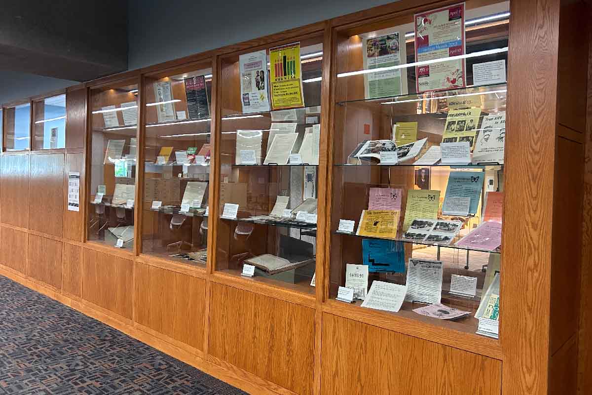 wooden shelves with papers, books, and other items surrounding research materials on the history of the American West
